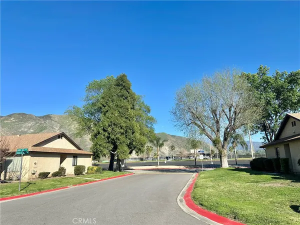 a house with trees in the background