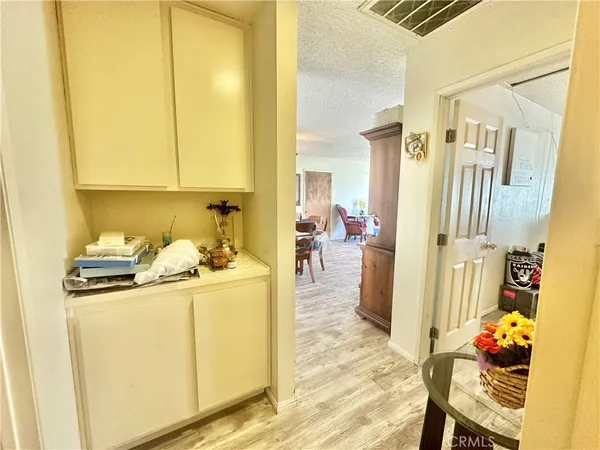 a utility room with sink dryer and washer