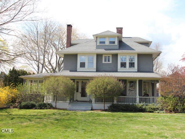 842 Old Post Road Fairfield, CT 06824 - Photo 1 of 1 a front view of a house with a yard