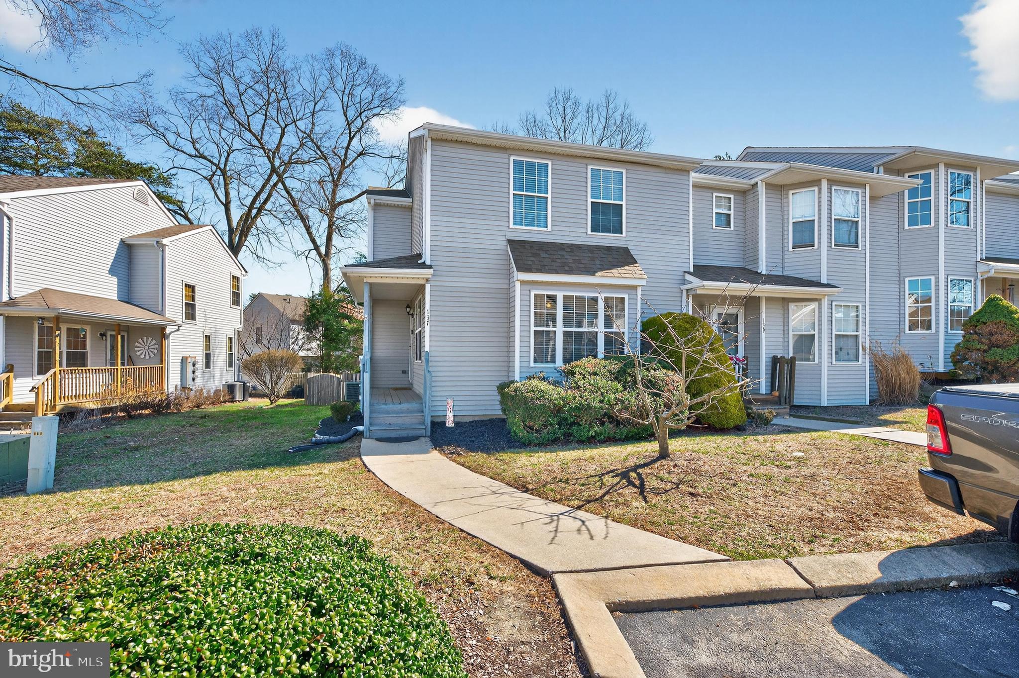 137 Pendragon Way Mantua, NJ 08051 - Photo 1 of 25 a front view of a house with a yard