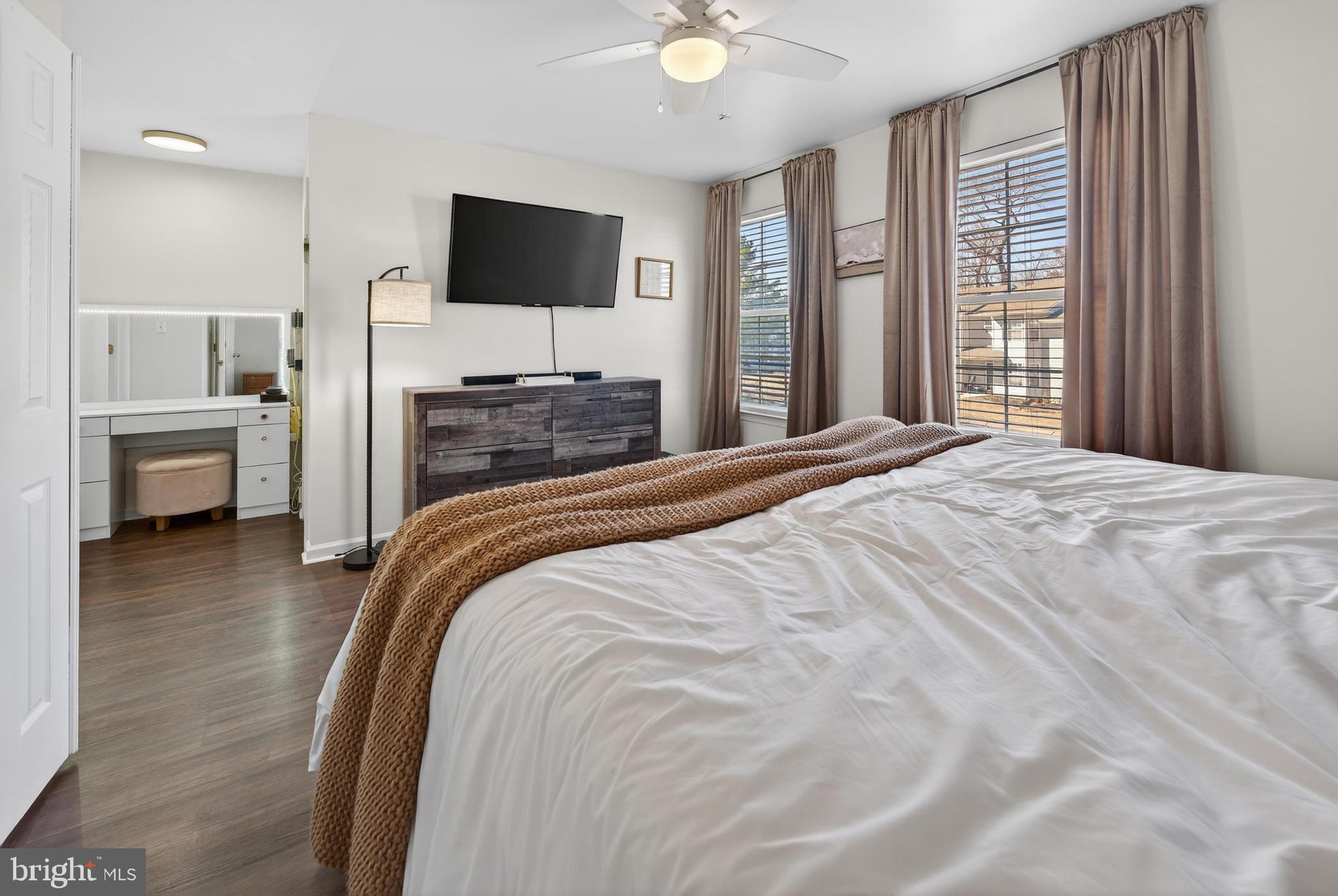 137 Pendragon Way Mantua, NJ 08051 - Photo 12 of 25 a bedroom with a bed and a flat screen tv