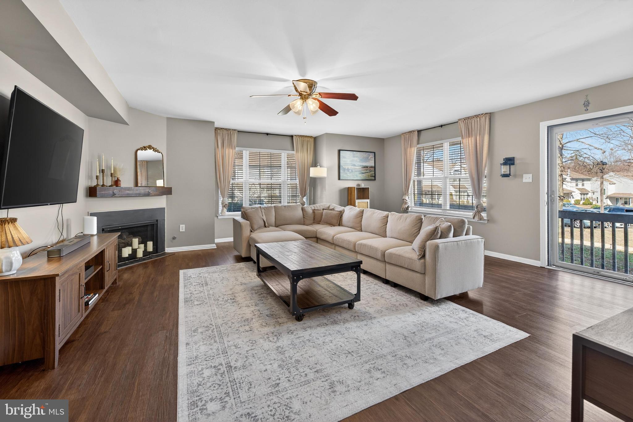 137 Pendragon Way Mantua, NJ 08051 - Photo 2 of 25 a living room with furniture and a flat screen tv