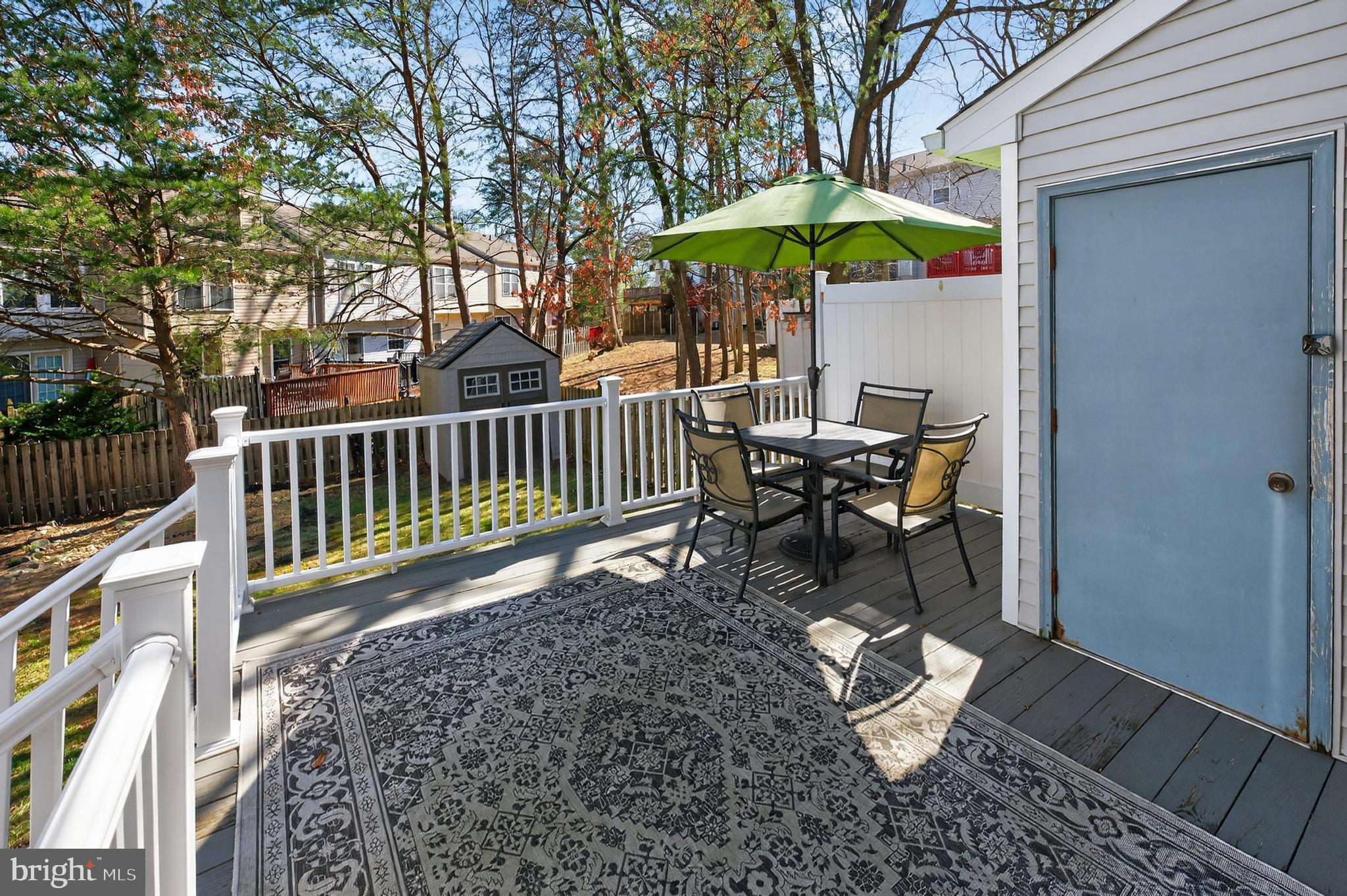 137 Pendragon Way Mantua, NJ 08051 - Photo 22 of 25 a view of a table and chairs under an umbrella