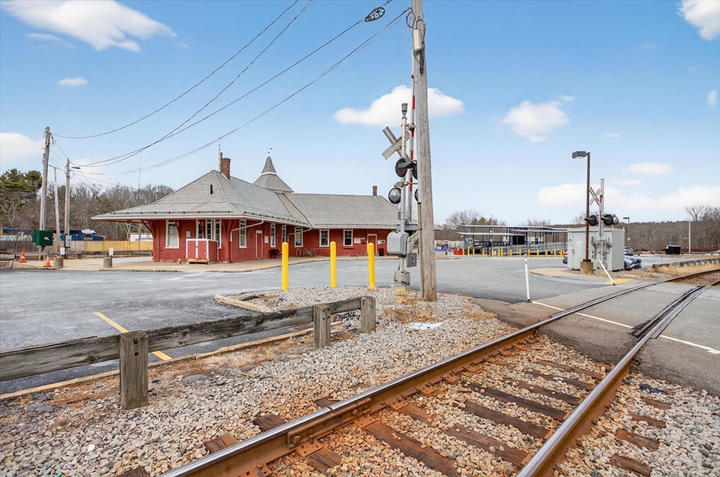 881 Main Street, Unit 9 Walpole, MA 02081 - Photo 17 of 25 a view of a terrace with wooden floor
