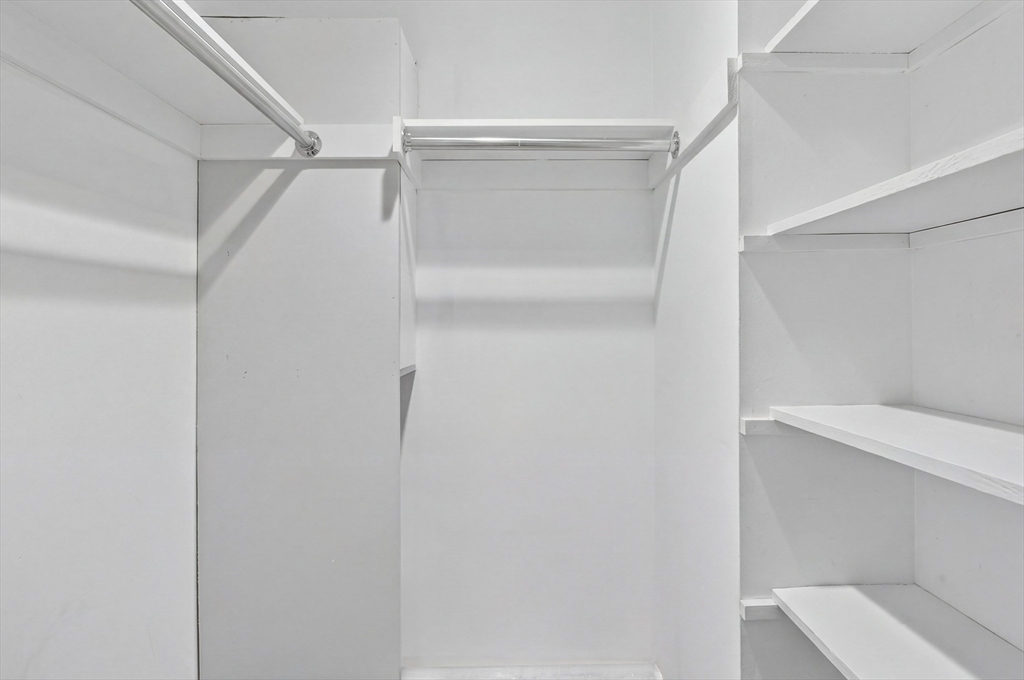 881 Main Street, Unit 9 Walpole, MA 02081 - Photo 9 of 23 a view of an empty walk in closet