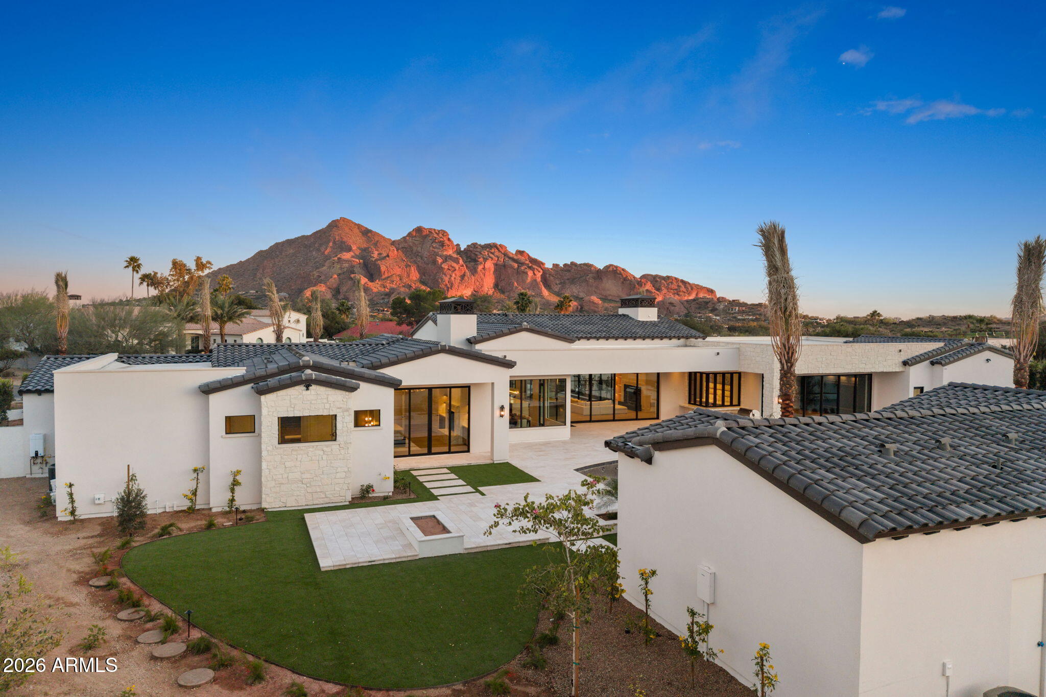 6610 North Mountain View Road Paradise Valley, AZ 85253 - Photo 13 of 27 a view of a house with a backyard and a tree