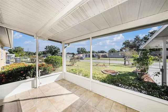 a view of swimming pool with a patio