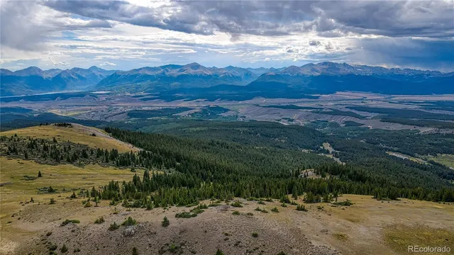 a view of a road with a mountain in the background
