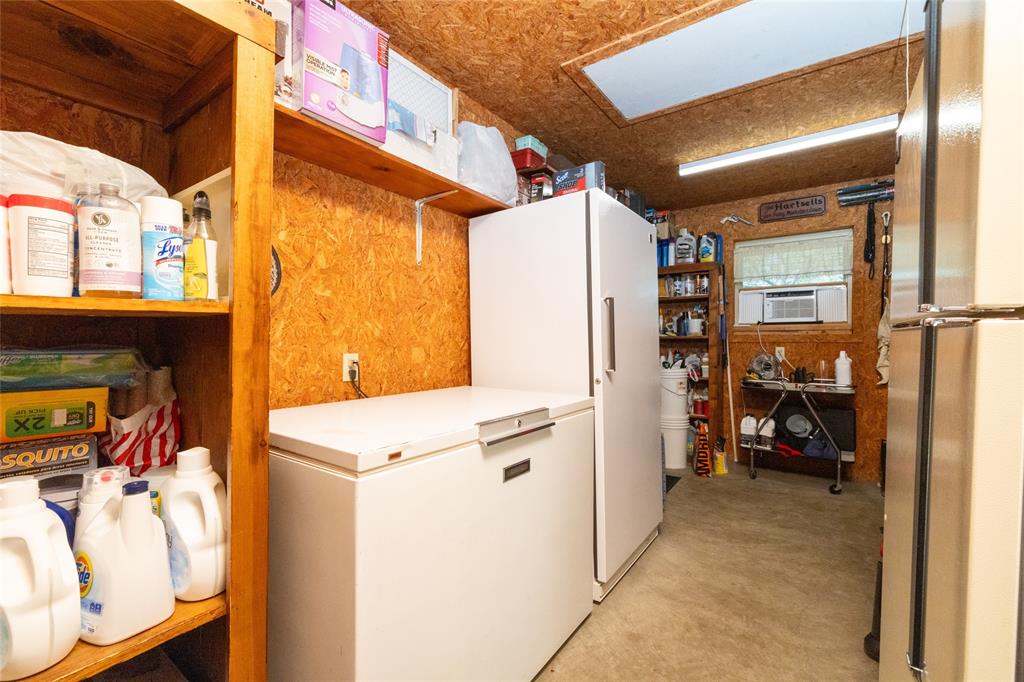 970 Live Oak Road Santo, TX 76472 - Photo 33 of 40 a view of storage and utility room
