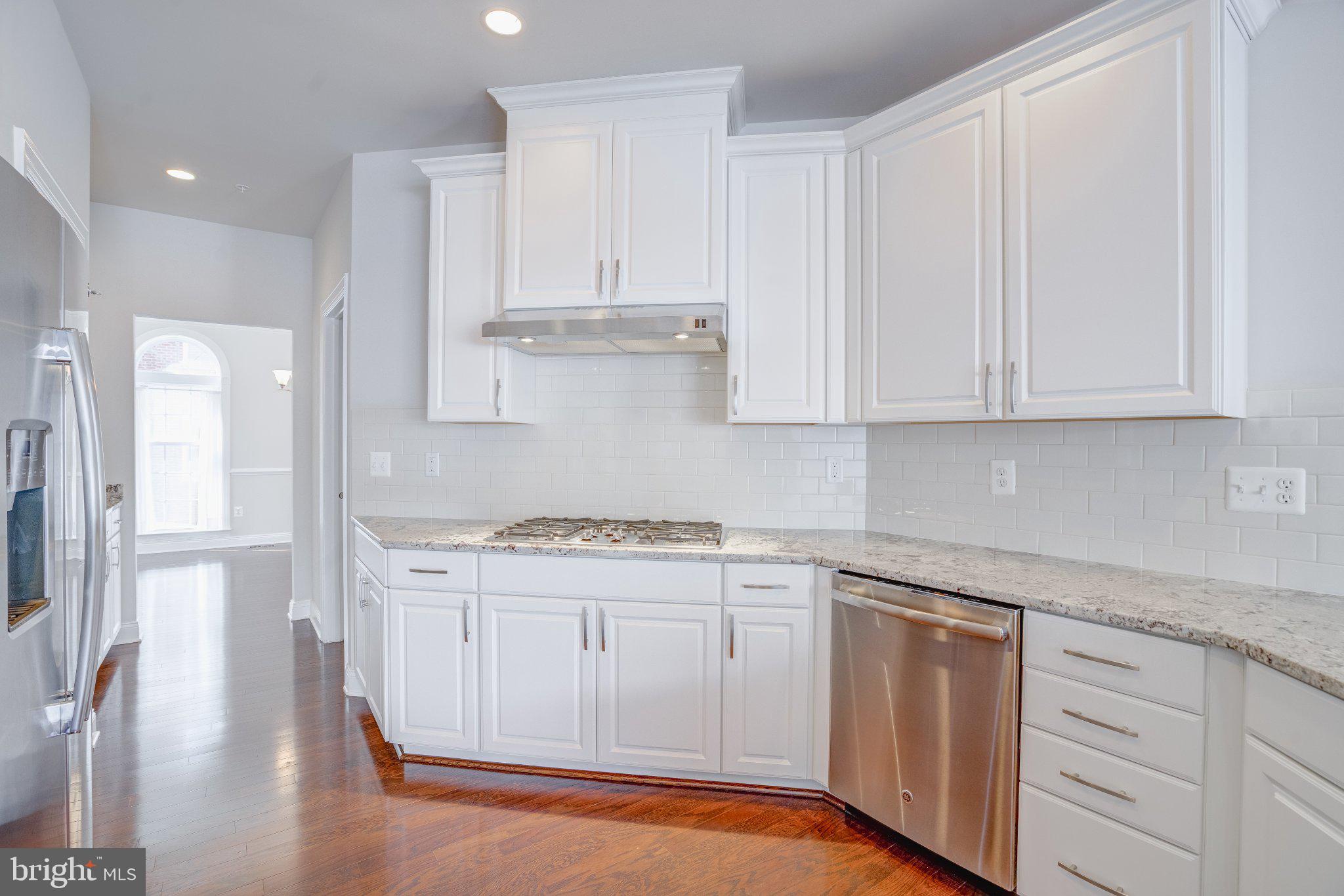 2517 Cherry Tree Road Hanover, MD 21076 - Photo 18 of 61 Modern kitchen with sleek finishes.