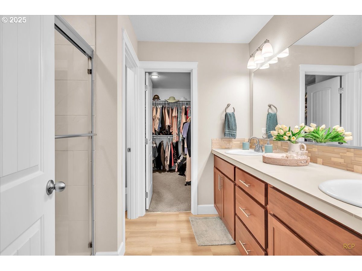 35560 Valley View Drive St. Helens, OR 97051 - Photo 30 of 47 a bathroom with a sink a mirror and a shower