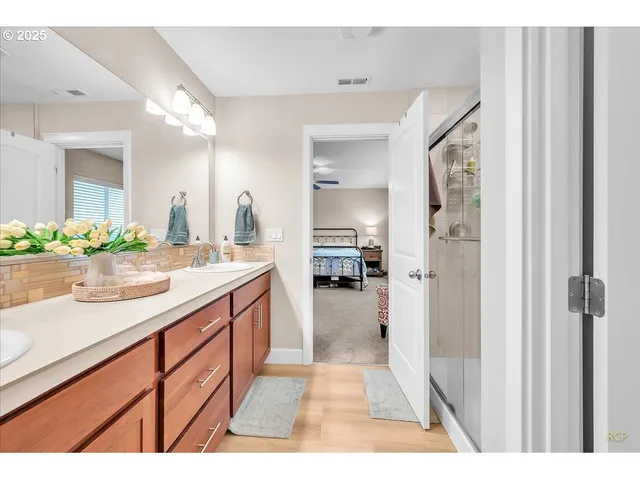 a bedroom with a bed and a couch