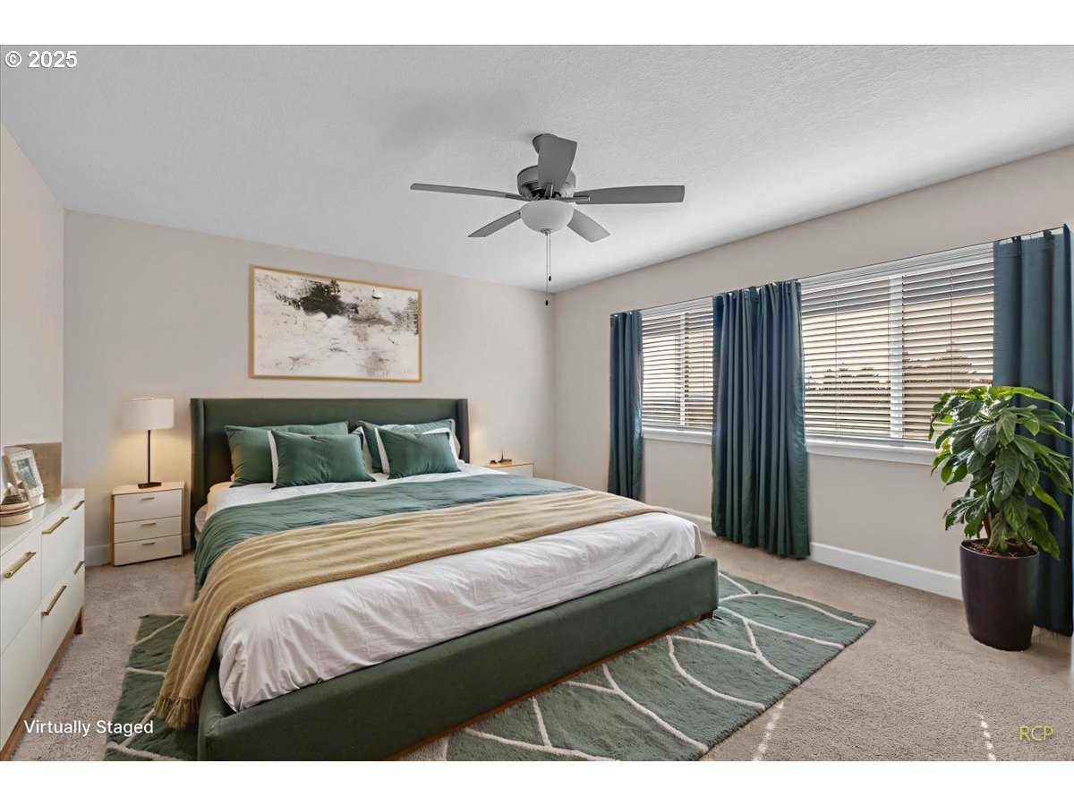 35560 Valley View Drive St. Helens, OR 97051 - Photo 45 of 47 a bedroom with a balcony a bed and a chandelier