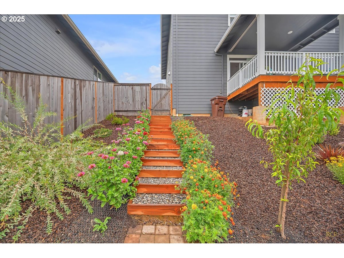 35560 Valley View Drive St. Helens, OR 97051 - Photo 7 of 47 a view of a backyard with pathway