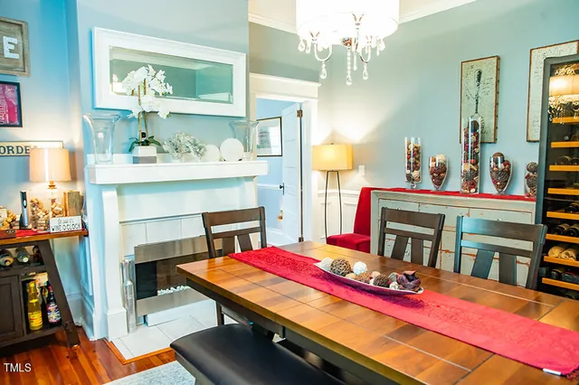 a bedroom with a bed and a fireplace