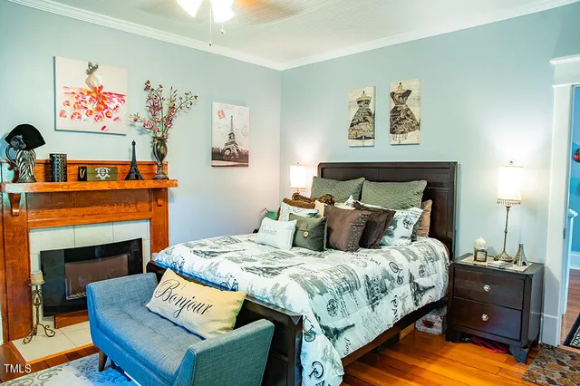 a bedroom with a bed and a rug