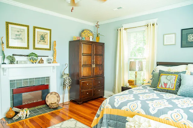 a view of backyard with outdoor seating and trees