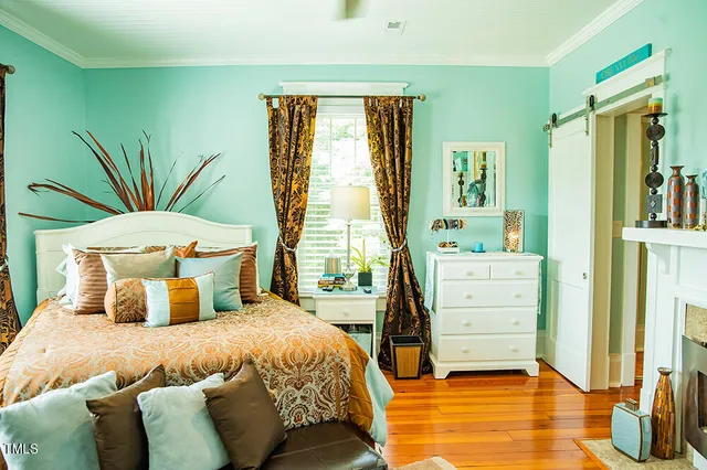 a view of a house with swimming pool and sitting area