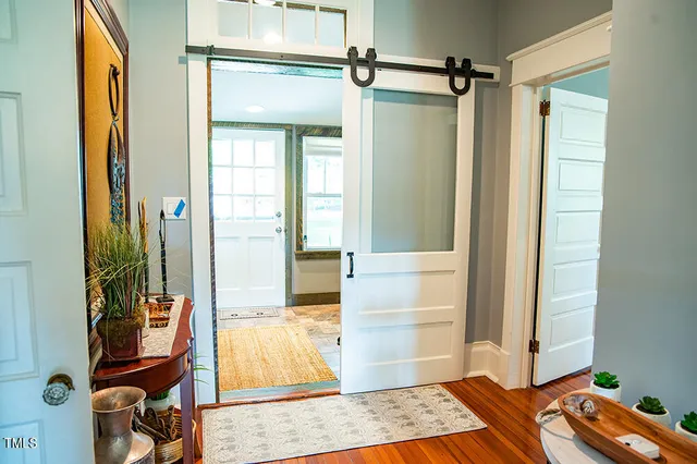 a view of a chairs and table in a backyard