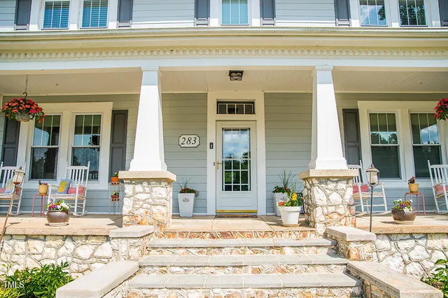 a living room with furniture and a couch
