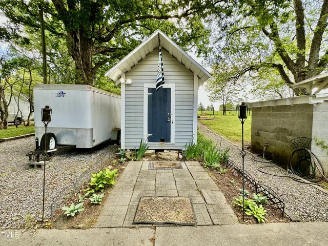 a view of a park with a tree