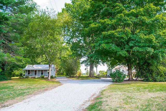 a view of a lake with a building in the background
