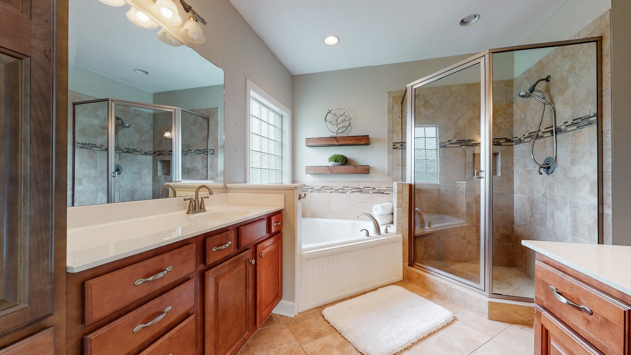 1805 North Lovvorn Road Christiana, TN 37037 - Photo 24 of 54 a bathroom with a shower sink and mirror