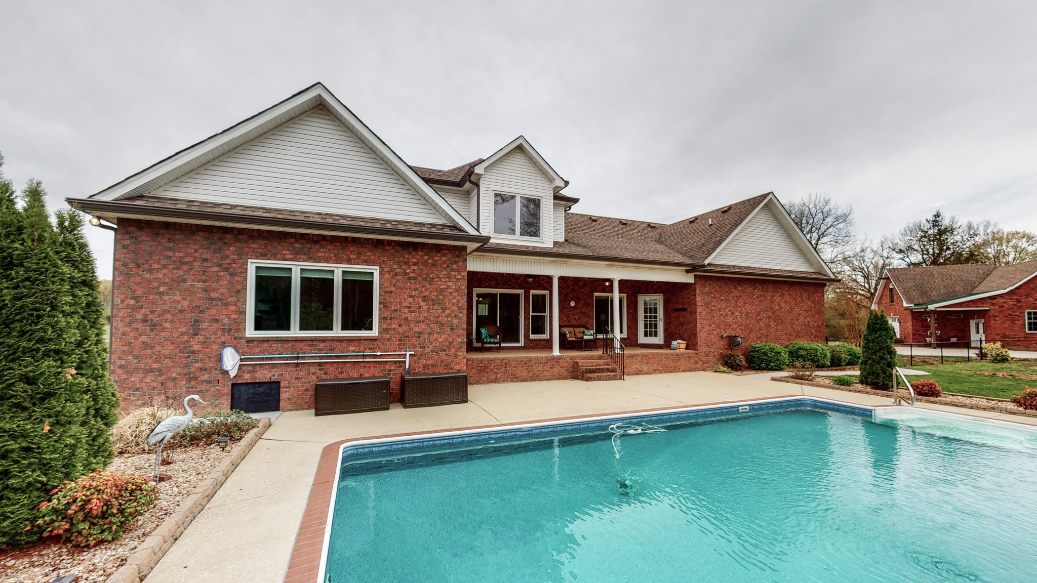 1805 North Lovvorn Road Christiana, TN 37037 - Photo 45 of 54 a front view of a house with sitting area and swimming pool