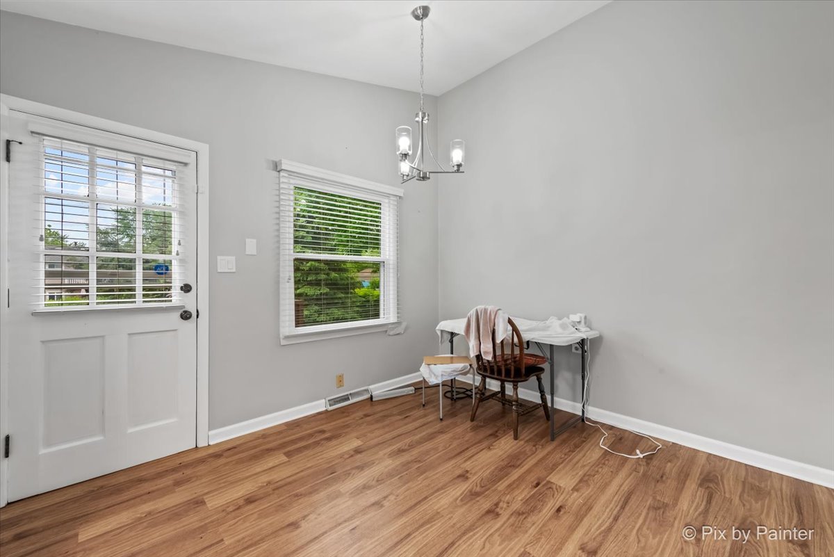 2302 Birch Lane Rolling Meadows, IL 60008 - Photo 13 of 30 a living room with furniture and a wooden floor