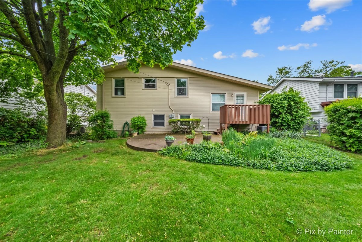 2302 Birch Lane Rolling Meadows, IL 60008 - Photo 29 of 30 a view of a backyard with plants and a patio