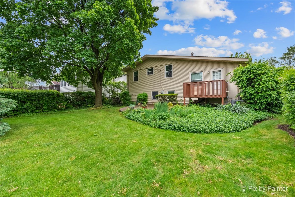 2302 Birch Lane Rolling Meadows, IL 60008 - Photo 30 of 30 a view of a house with backyard and garden