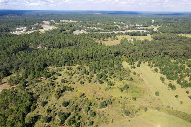 a view of a lake with a big yard