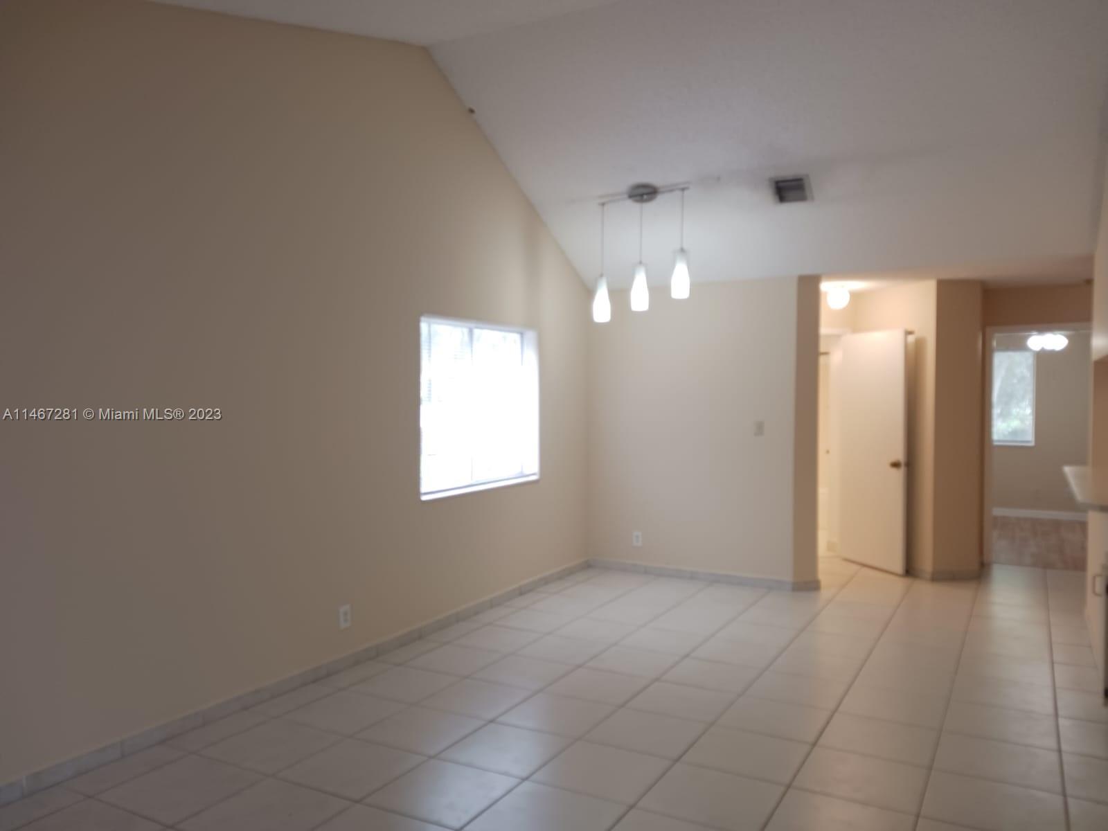 The Hammocks Miami, FL 33186 - Photo 14 of 17 a view of an empty room with a bathroom