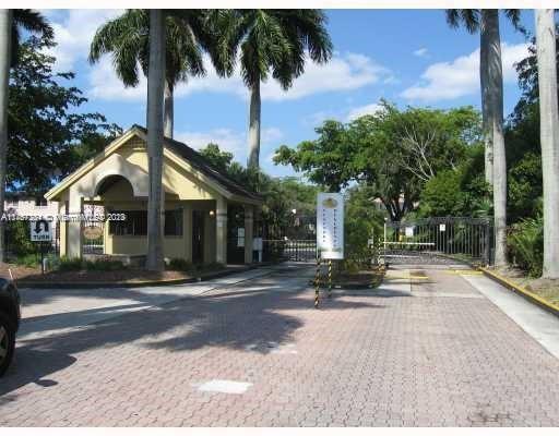 The Hammocks Miami, FL 33186 - Photo 2 of 17 a front view of a house with a yard and garage