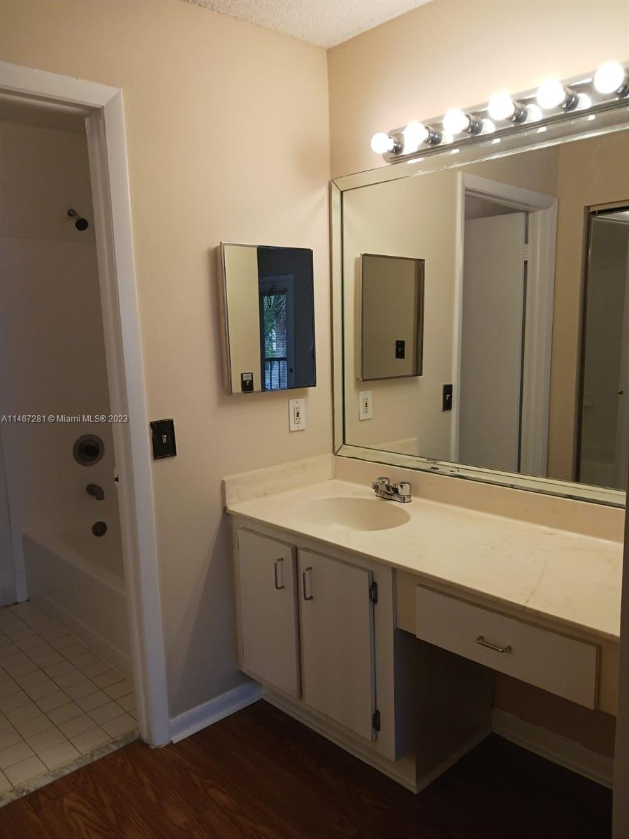 The Hammocks Miami, FL 33186 - Photo 8 of 17 a bathroom with a sink and a mirror