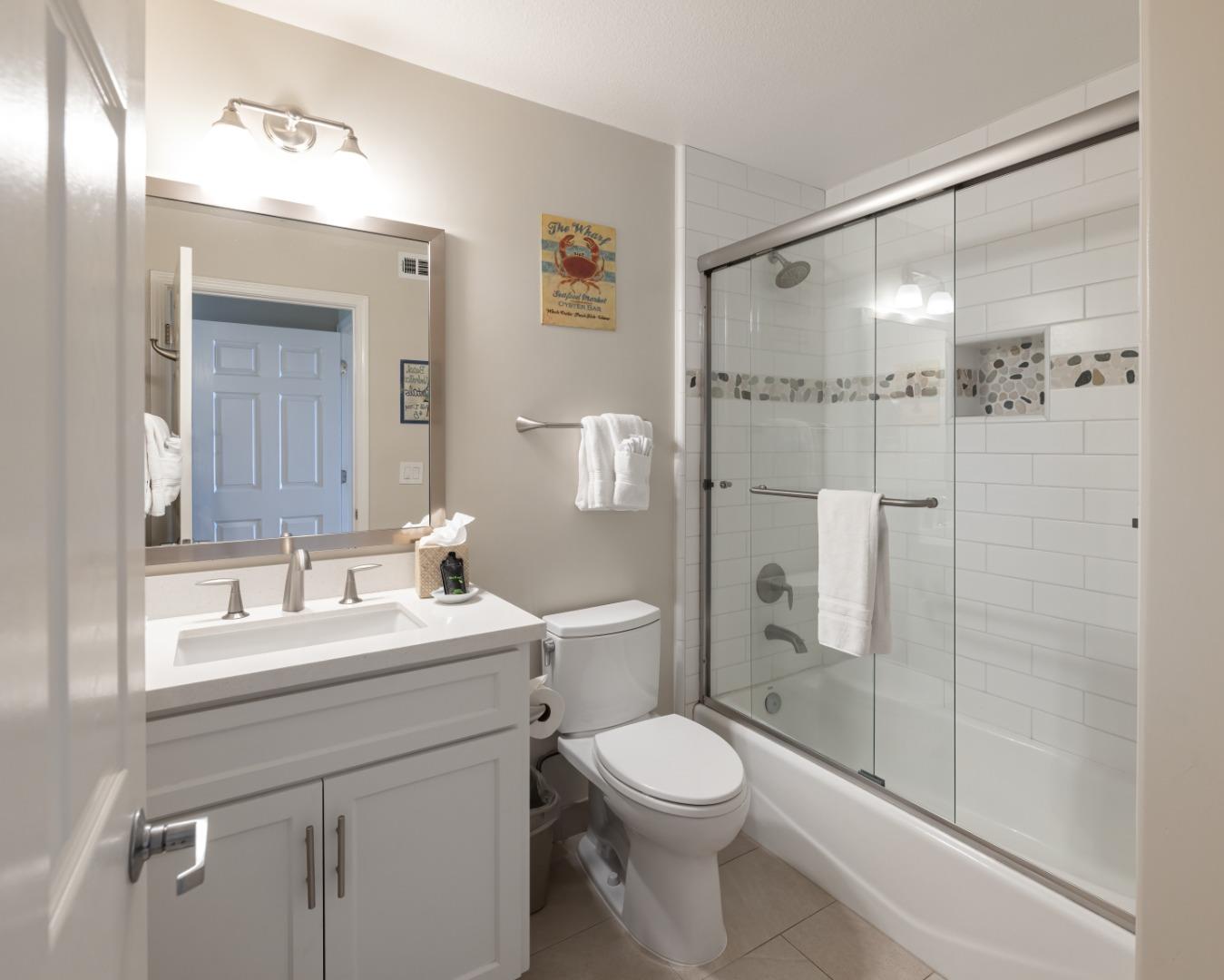 443 Seascape Resort Drive Aptos, CA 95003 - Photo 16 of 33 a bathroom with a sink toilet and shower