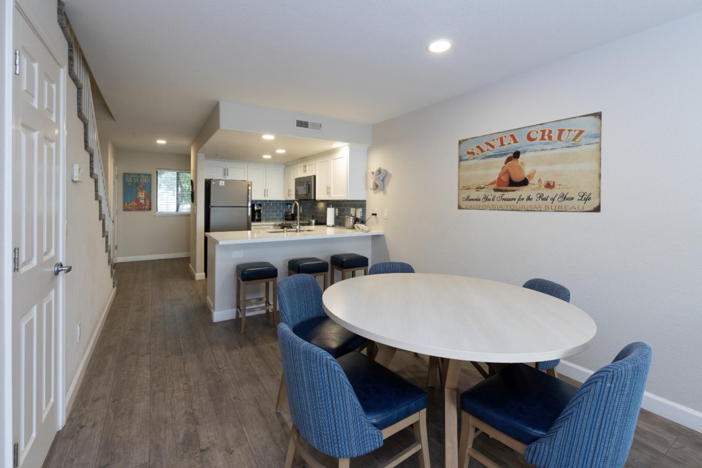 443 Seascape Resort Drive Aptos, CA 95003 - Photo 20 of 33 a view of a dining room with furniture and wooden floor