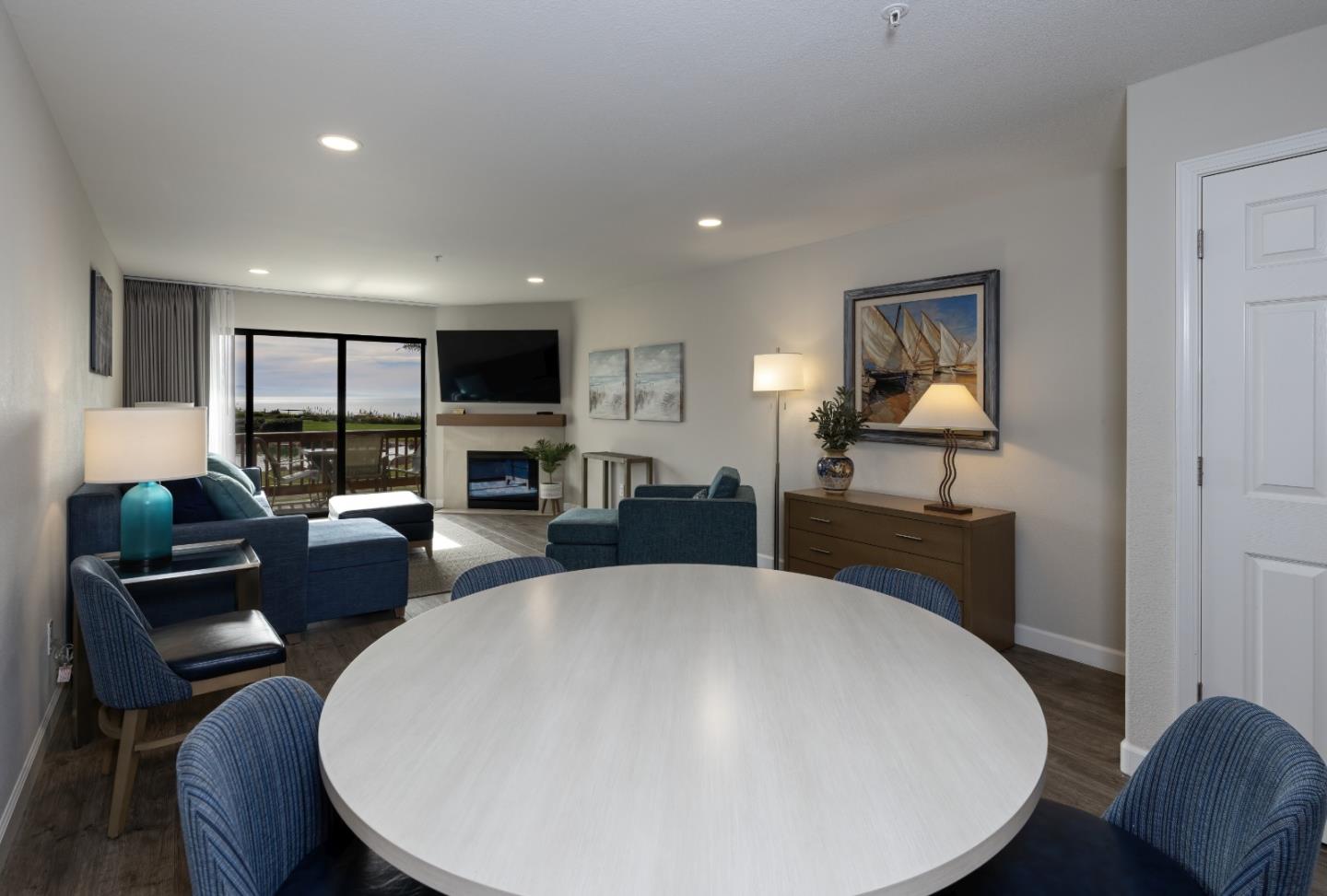 443 Seascape Resort Drive Aptos, CA 95003 - Photo 21 of 33 a living room with fireplace furniture and a flat screen tv