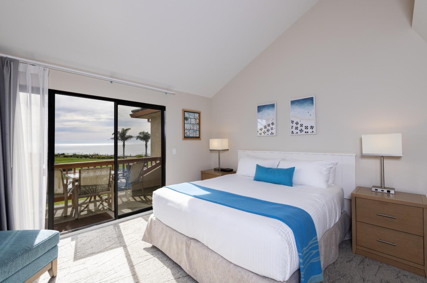 443 Seascape Resort Drive Aptos, CA 95003 - Photo 4 of 33 a bedroom with a large bed and a large window