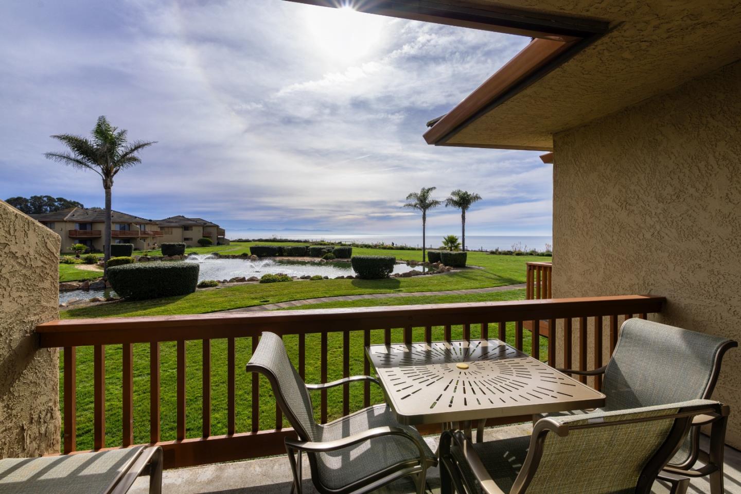 443 Seascape Resort Drive Aptos, CA 95003 - Photo 9 of 33 a view of a balcony with wooden floor and outdoor seating