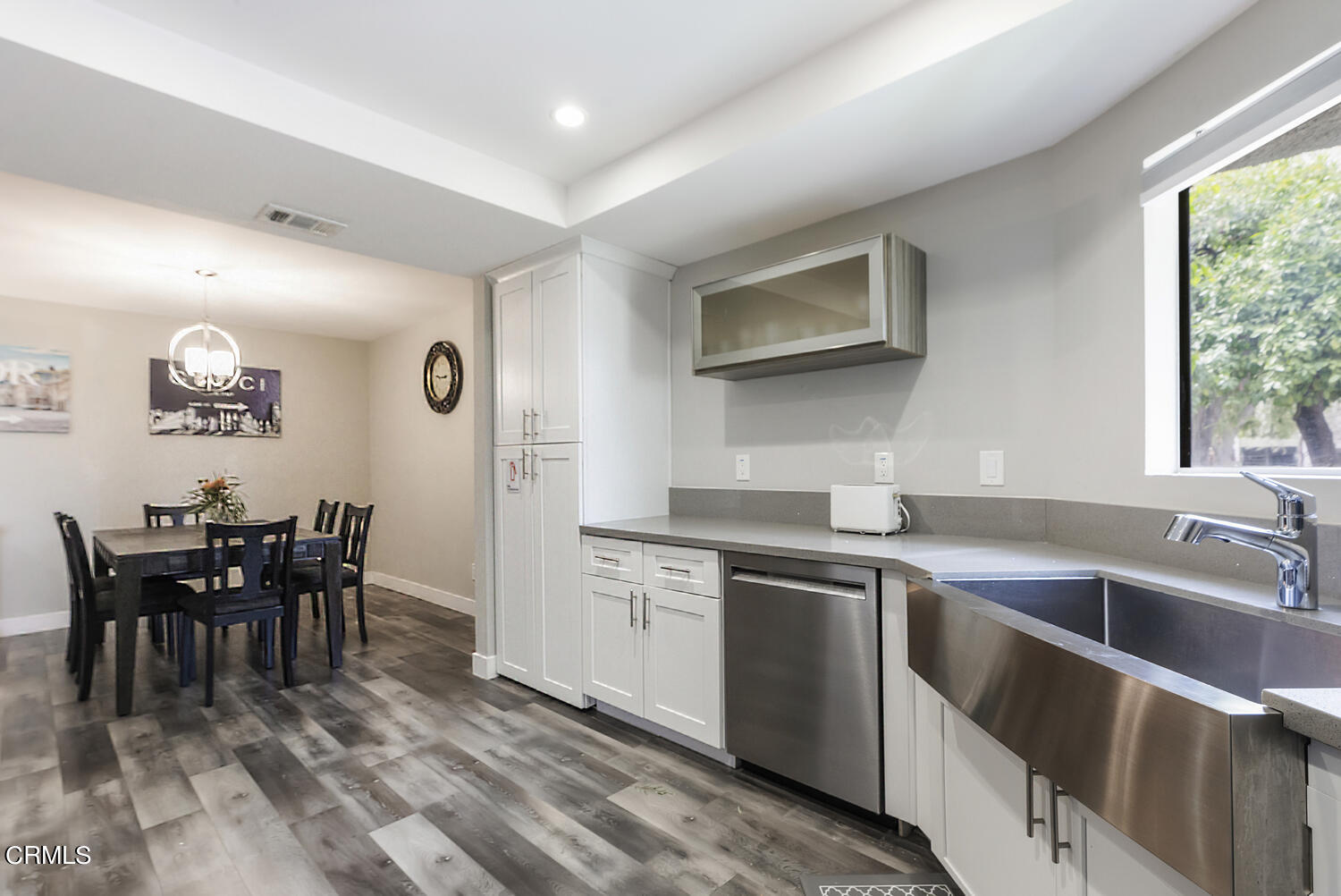 3155 Ramon Road, Unit 303 Palm Springs, CA 92264 - Photo 15 of 36 a kitchen with stainless steel appliances granite countertop a sink and stove