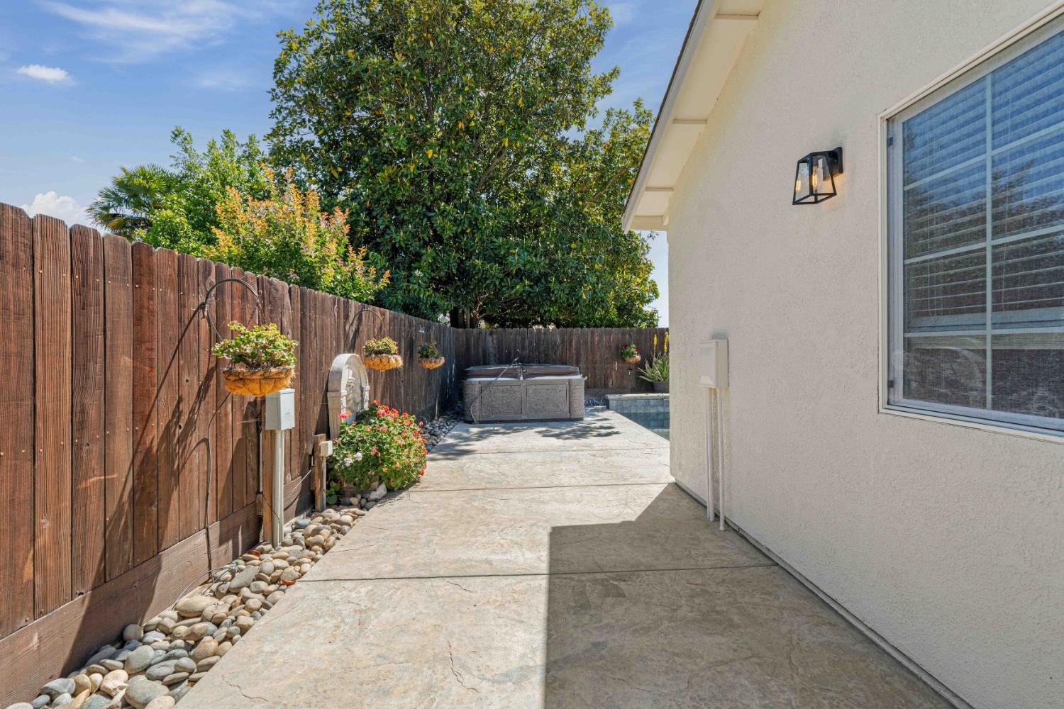1464 Denise Drive Ripon, CA 95366 - Photo 33 of 41 a view of a entrance gate of the house and trees