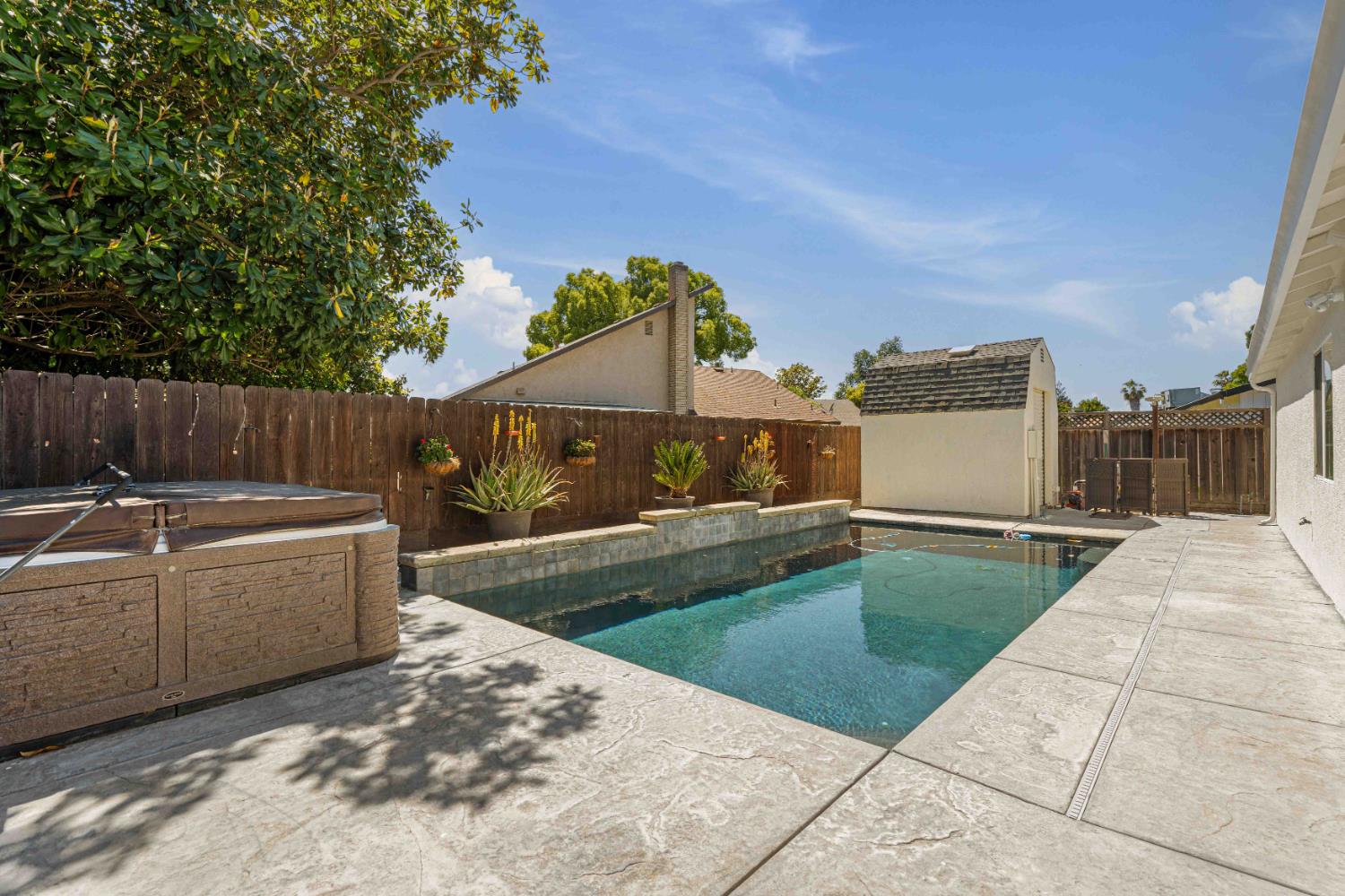 1464 Denise Drive Ripon, CA 95366 - Photo 34 of 41 a view of a white house in the back yard