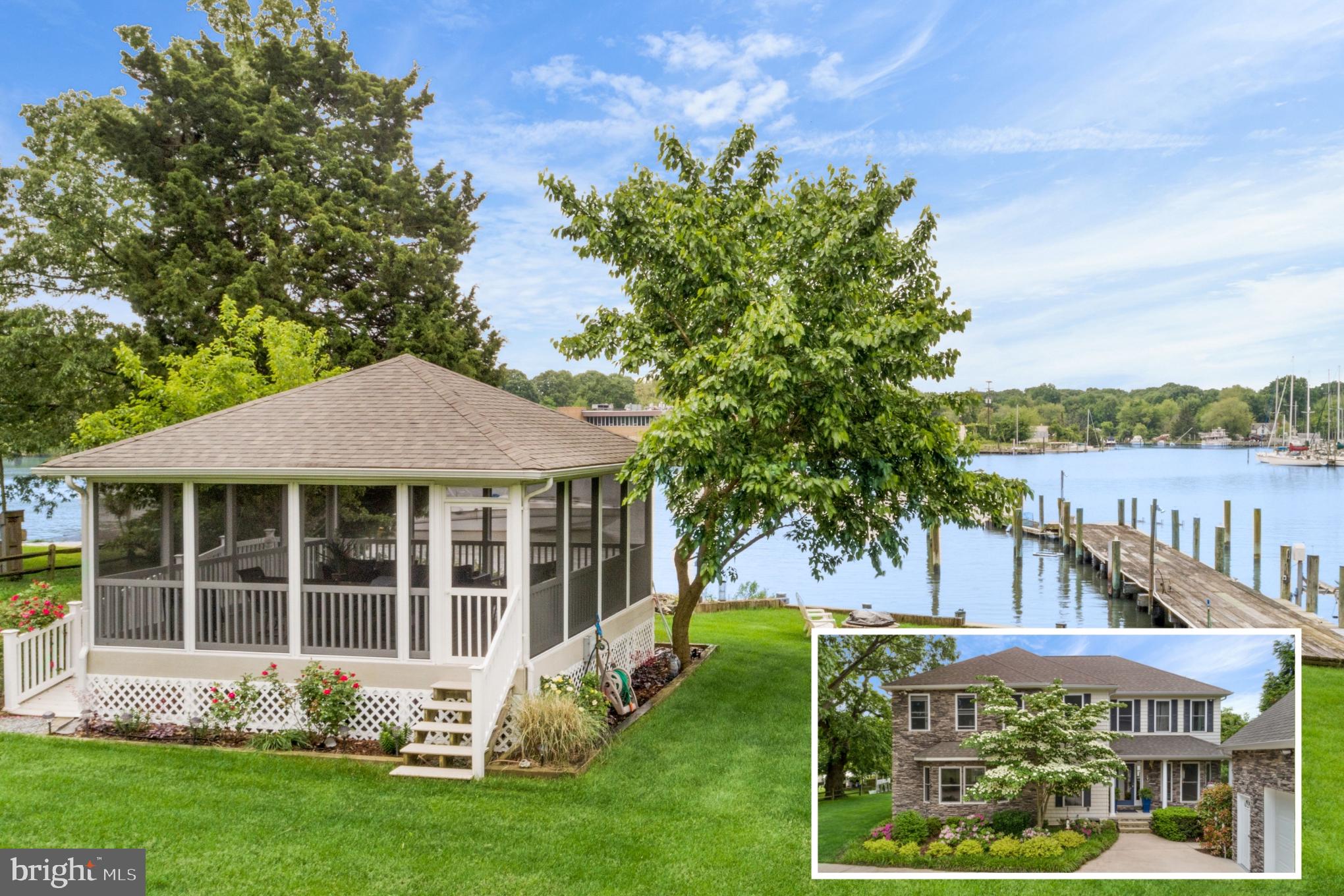 a view of a house with a yard and a garden
