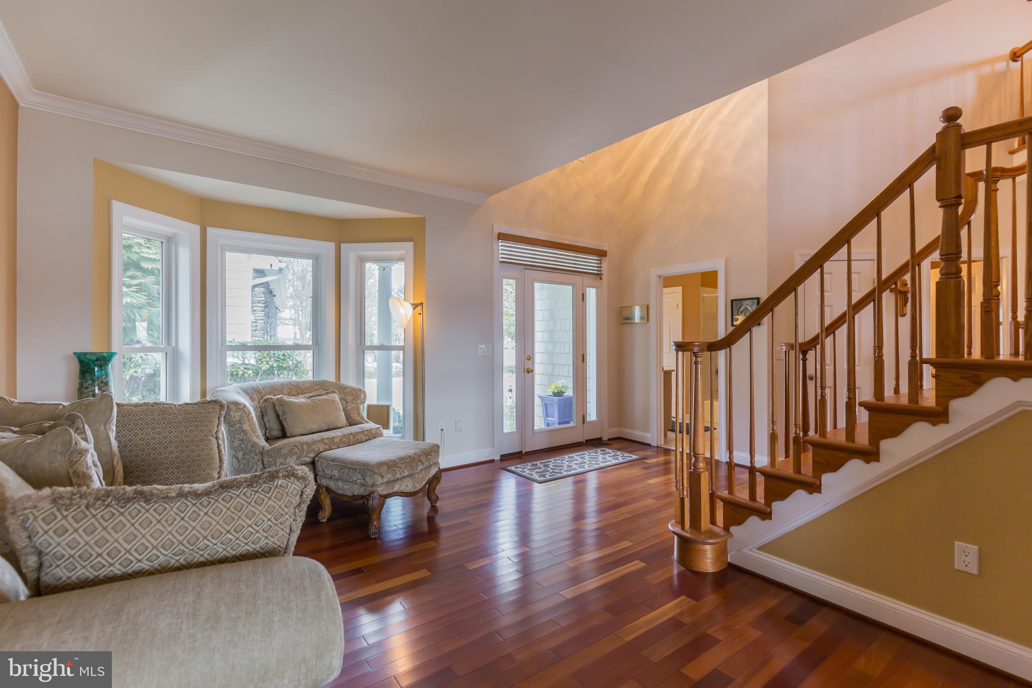 1457 Nieman Road Shady Side, MD 20764 - Photo 18 of 49 a living room with furniture and a large window