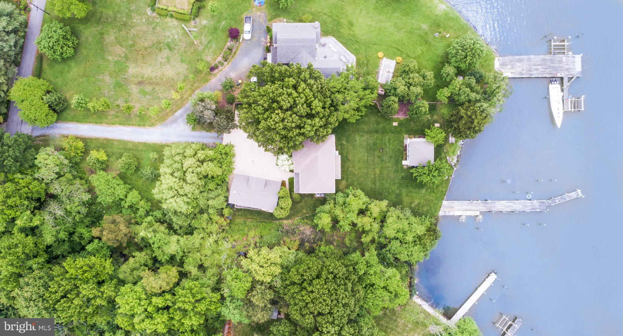 1457 Nieman Road Shady Side, MD 20764 - Photo 2 of 49 an aerial view of residential house with outdoor space and trees all around