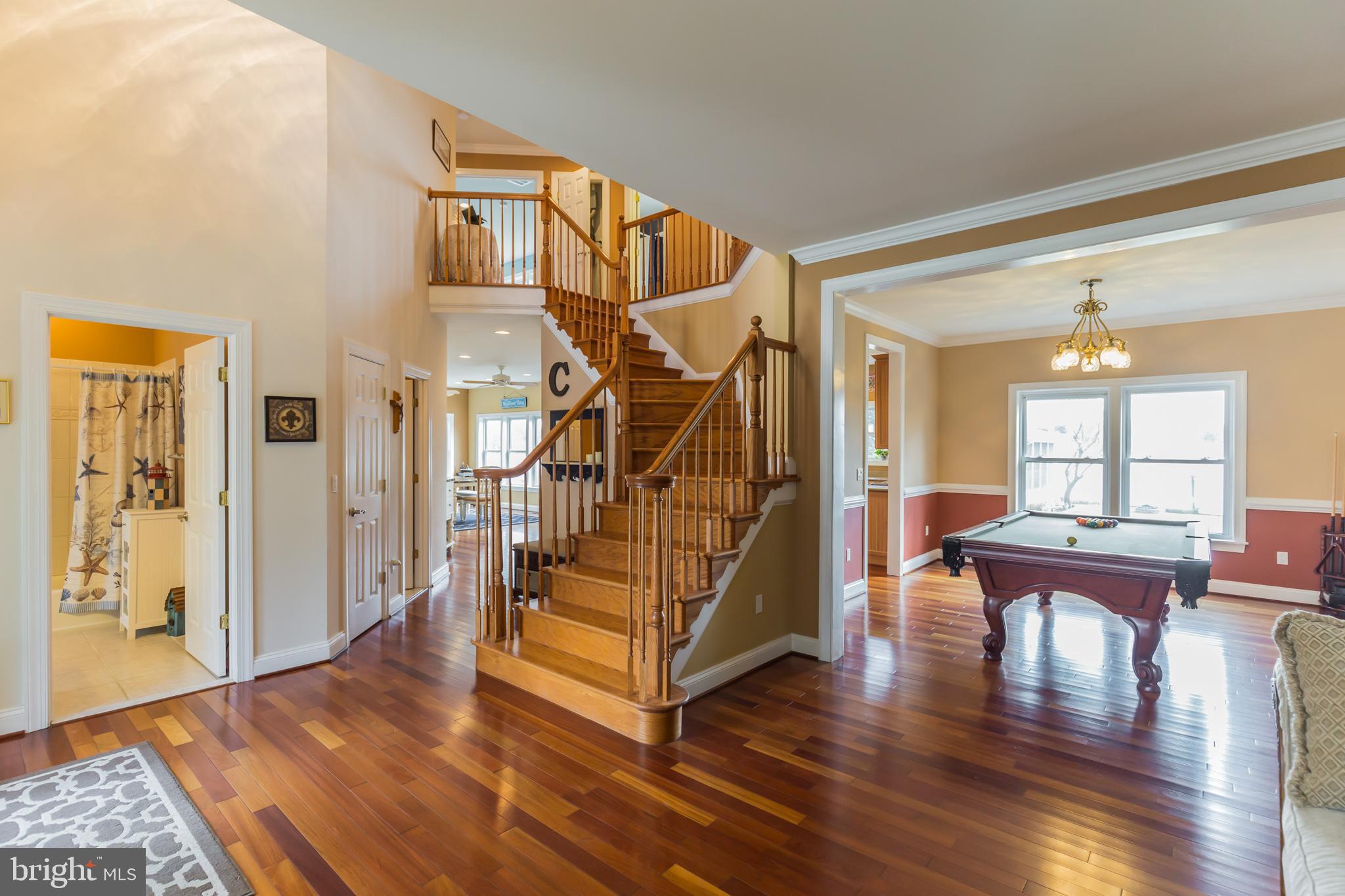 1457 Nieman Road Shady Side, MD 20764 - Photo 21 of 49 a view of entryway and hall with wooden floor