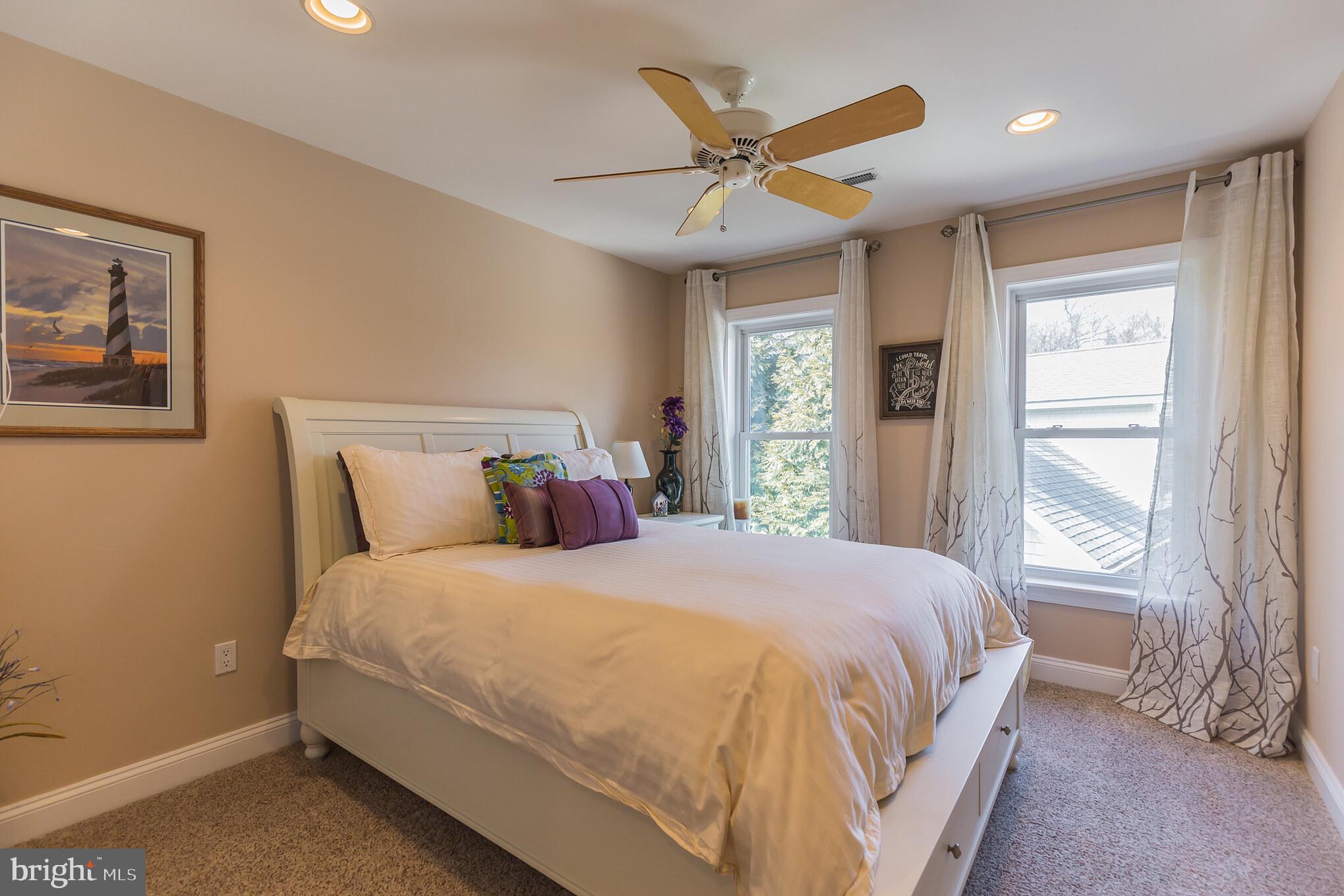 1457 Nieman Road Shady Side, MD 20764 - Photo 28 of 49 a bedroom with a large bed and a window
