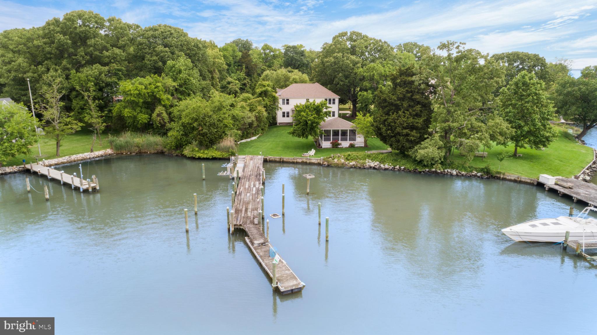 1457 Nieman Road Shady Side, MD 20764 - Photo 38 of 49 an aerial view of a house with swimming pool and lake view