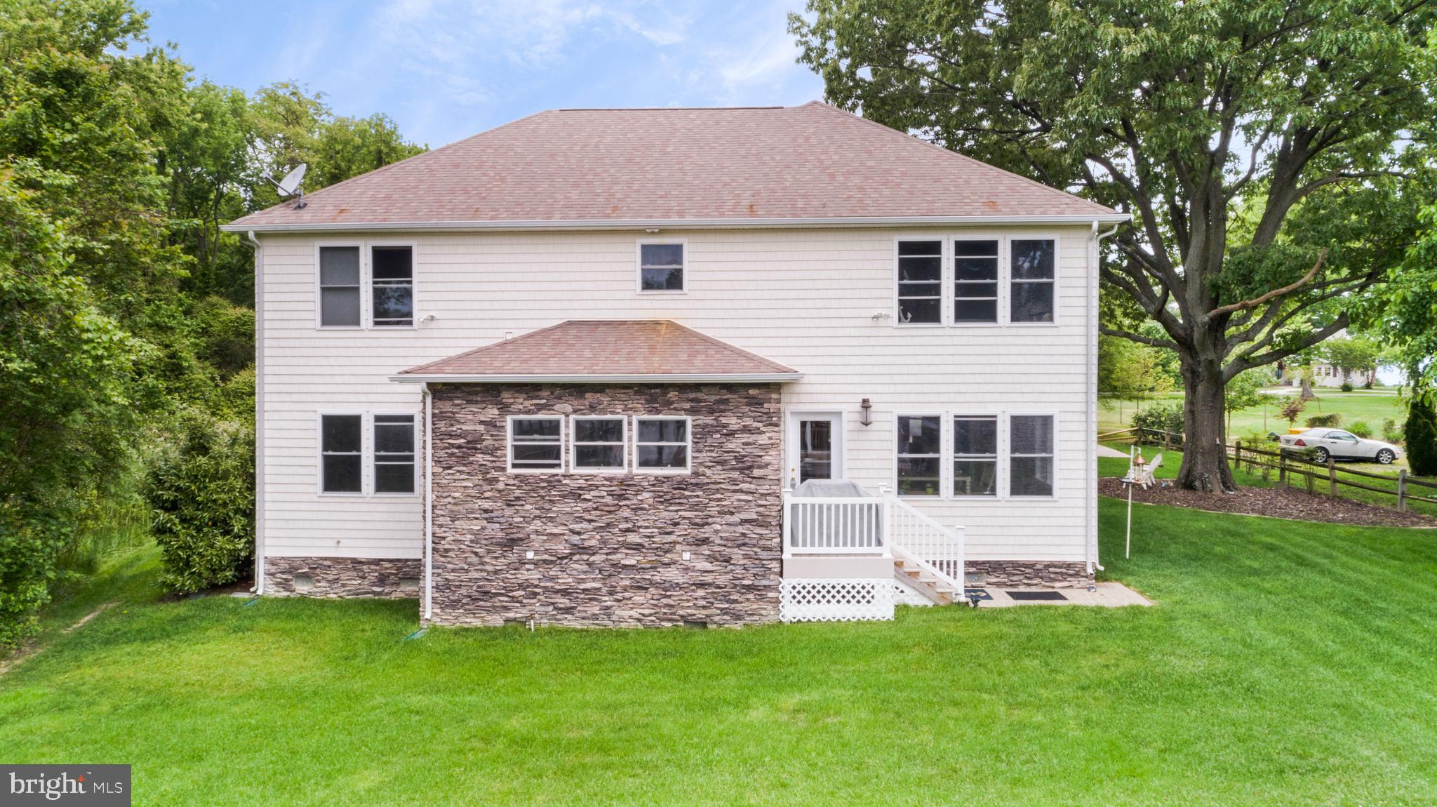 1457 Nieman Road Shady Side, MD 20764 - Photo 44 of 49 a front view of a house with a garden